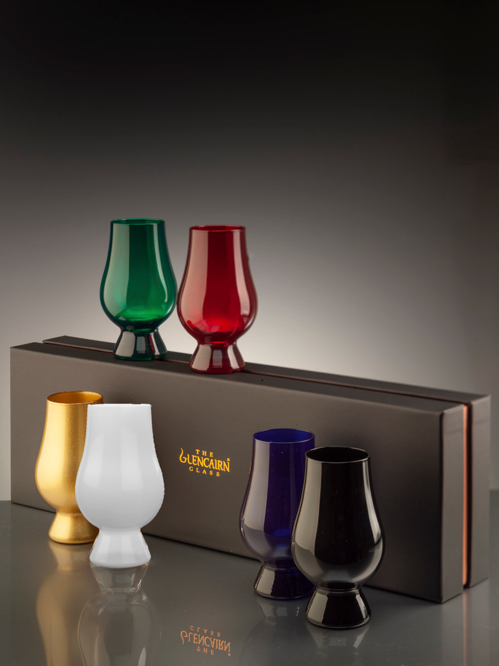 It features the world's favourite whisky glass in six different colours: black, blue, green, gold, red, and white. Supplied in a luxury black gift box.