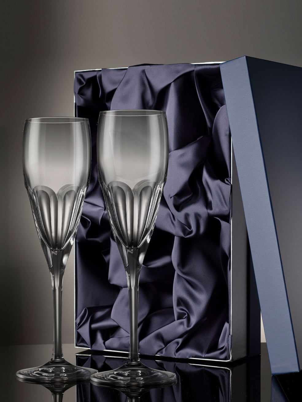 The Lewis collection is a weighted and resilient range that features a thumb cut pattern on the crystal, creating a sophisticated faceted effect.