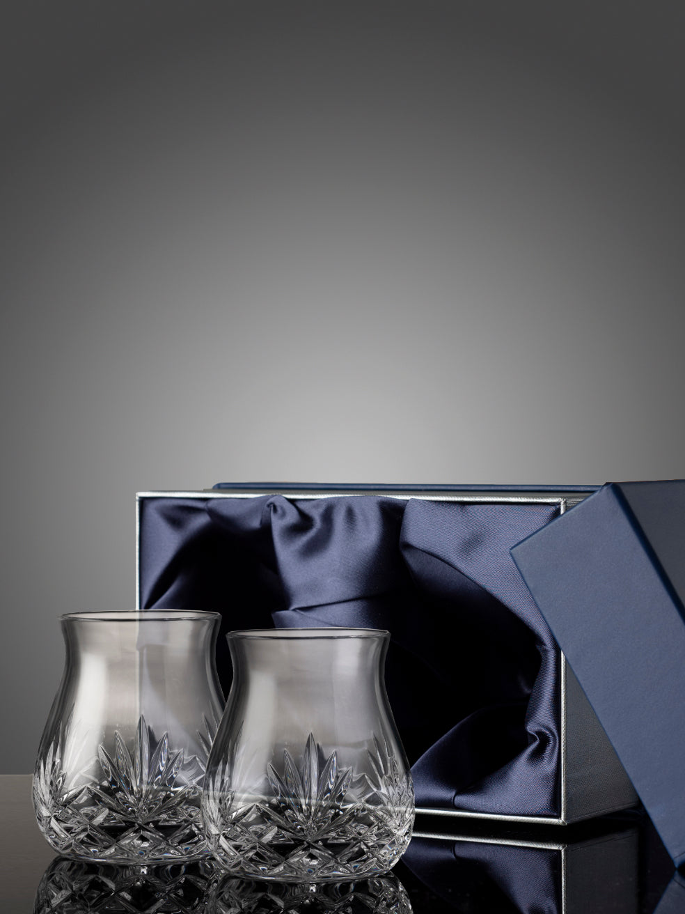 Pair of mouth-blown and hand cut lead crystal mixer glass.