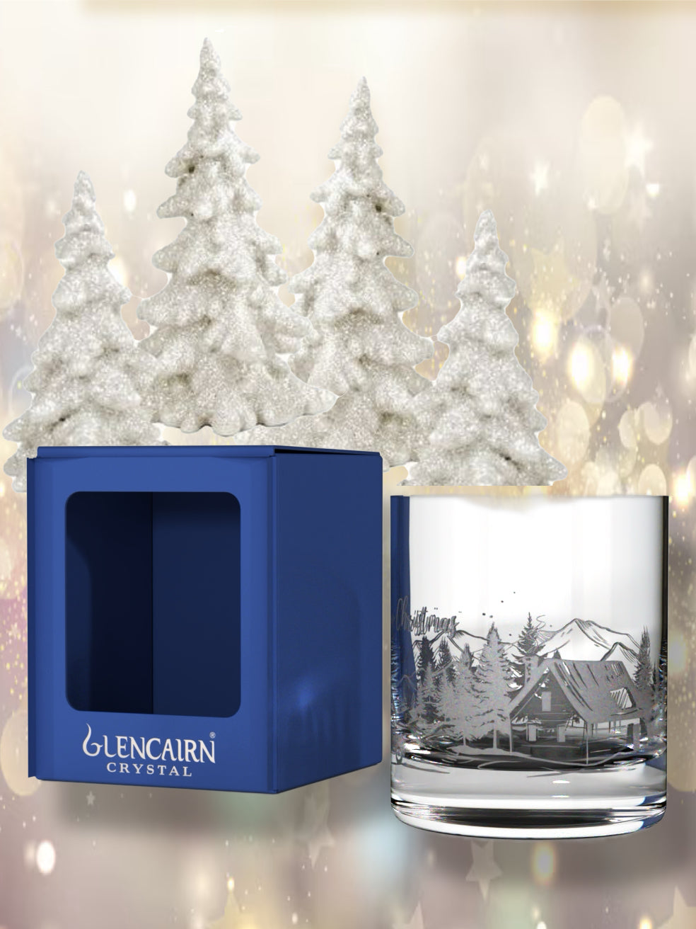 Lead-free crystal tumblers featuring bringing home the Christmas tree in a wrap-around wintery scene.