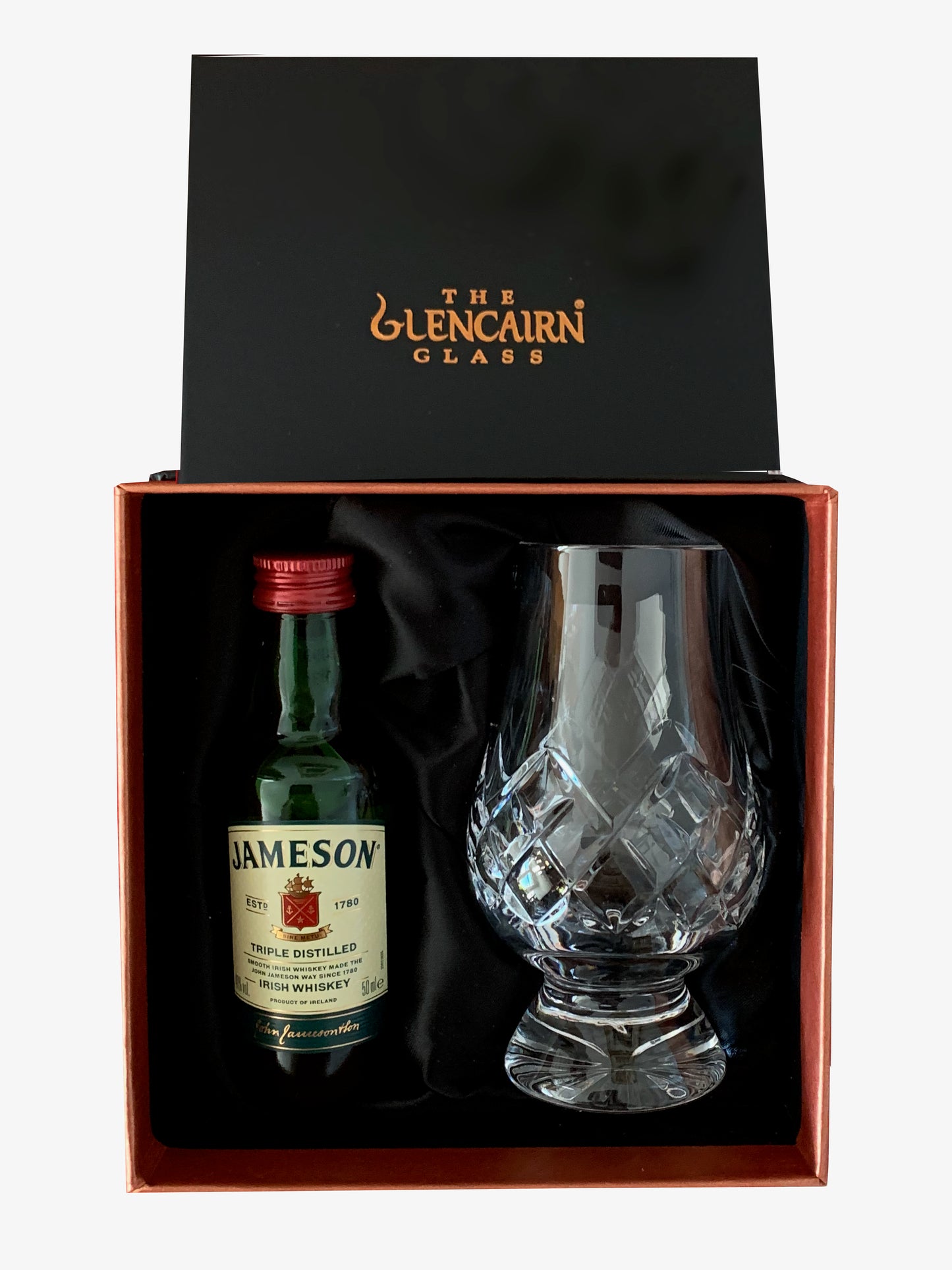 The Cut Glencairn Whisky Glass paired with a miniature bottle of Jameson Triple Distilled Whisky ready to gift in a luxurious presentation box.
