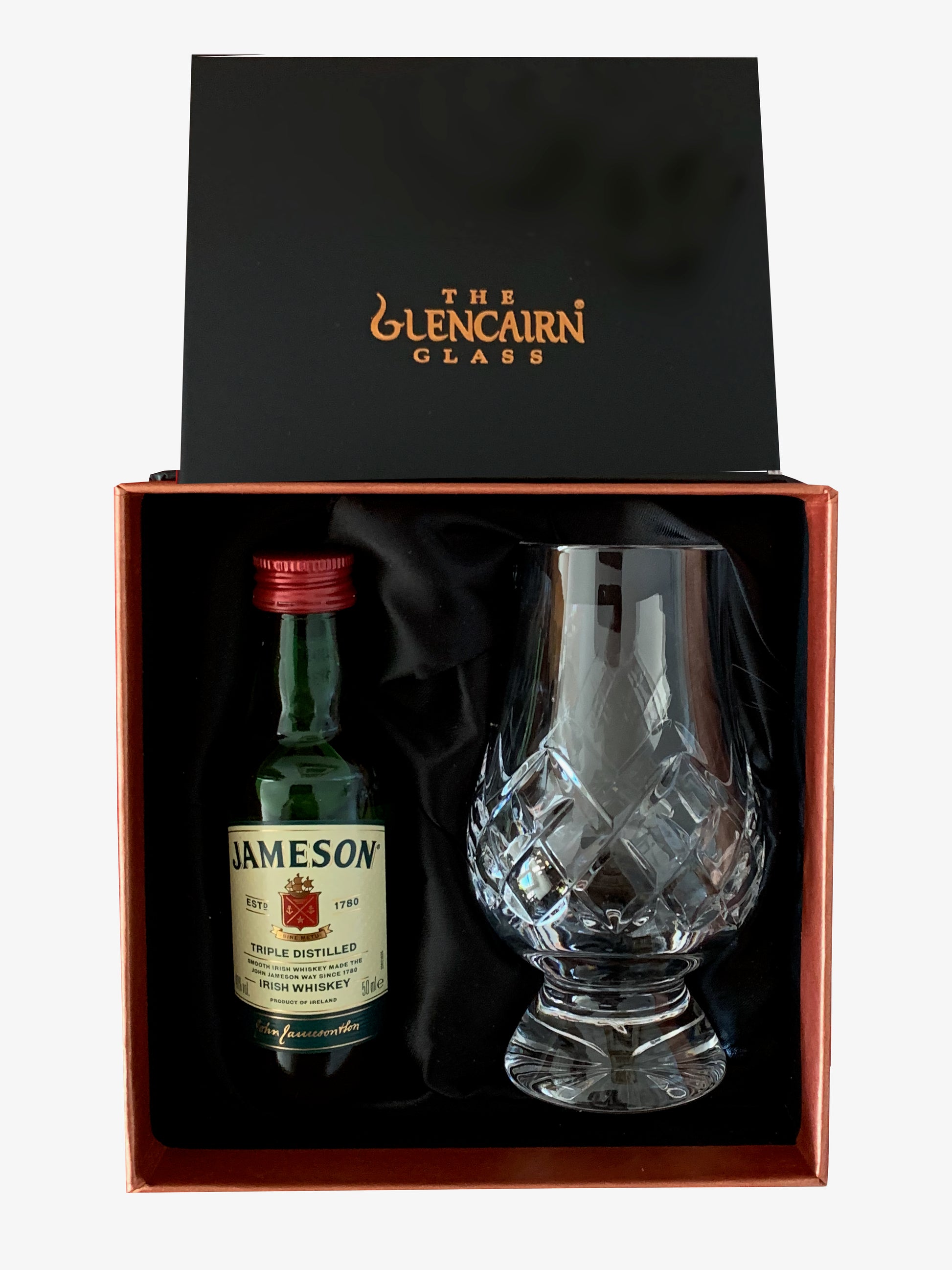 The Cut Glencairn Whisky Glass paired with a miniature bottle of Jameson Triple Distilled Whisky ready to gift in a luxurious presentation box.