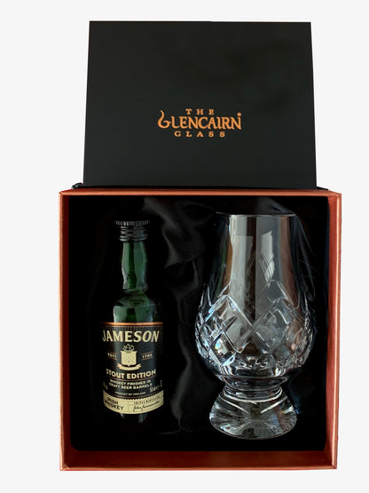The Cut Glencairn Whisky Glass paired with a miniature bottle of Jameson Stout Edition Whisky ready to gift in a luxurious presentation box.