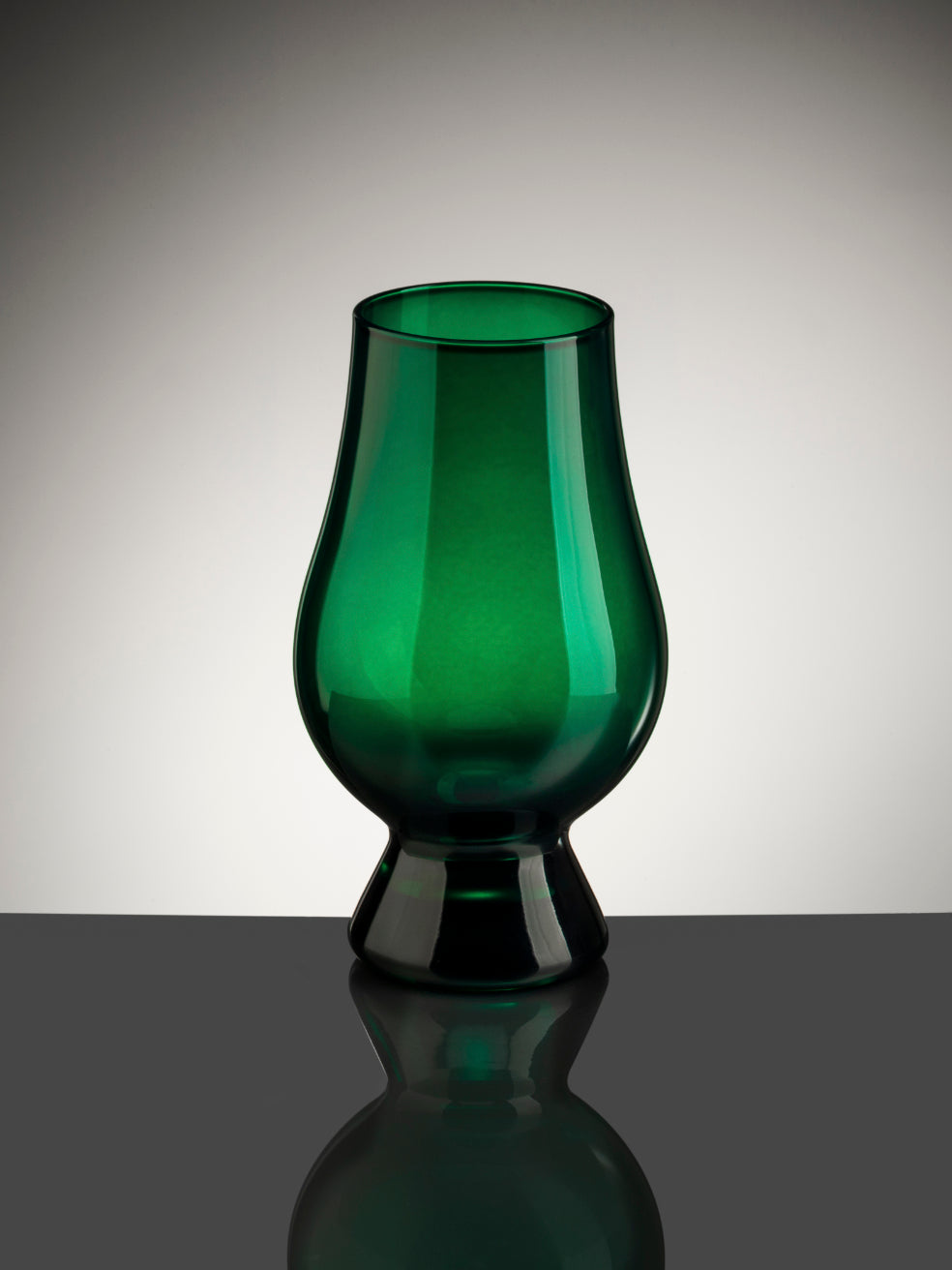 The Glencairn Whisky Glass in green.