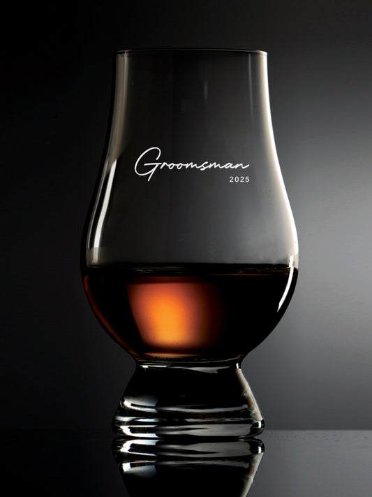 A gift for your groomsman that will be cherished for years to come.  This Glencairn Whisky Glass includes the year of your wedding.