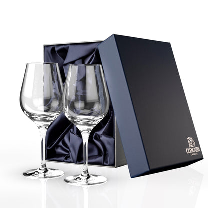 Two lead-free crystal red wine glasses from the Jura collection in a luxurious blue presentation box.
