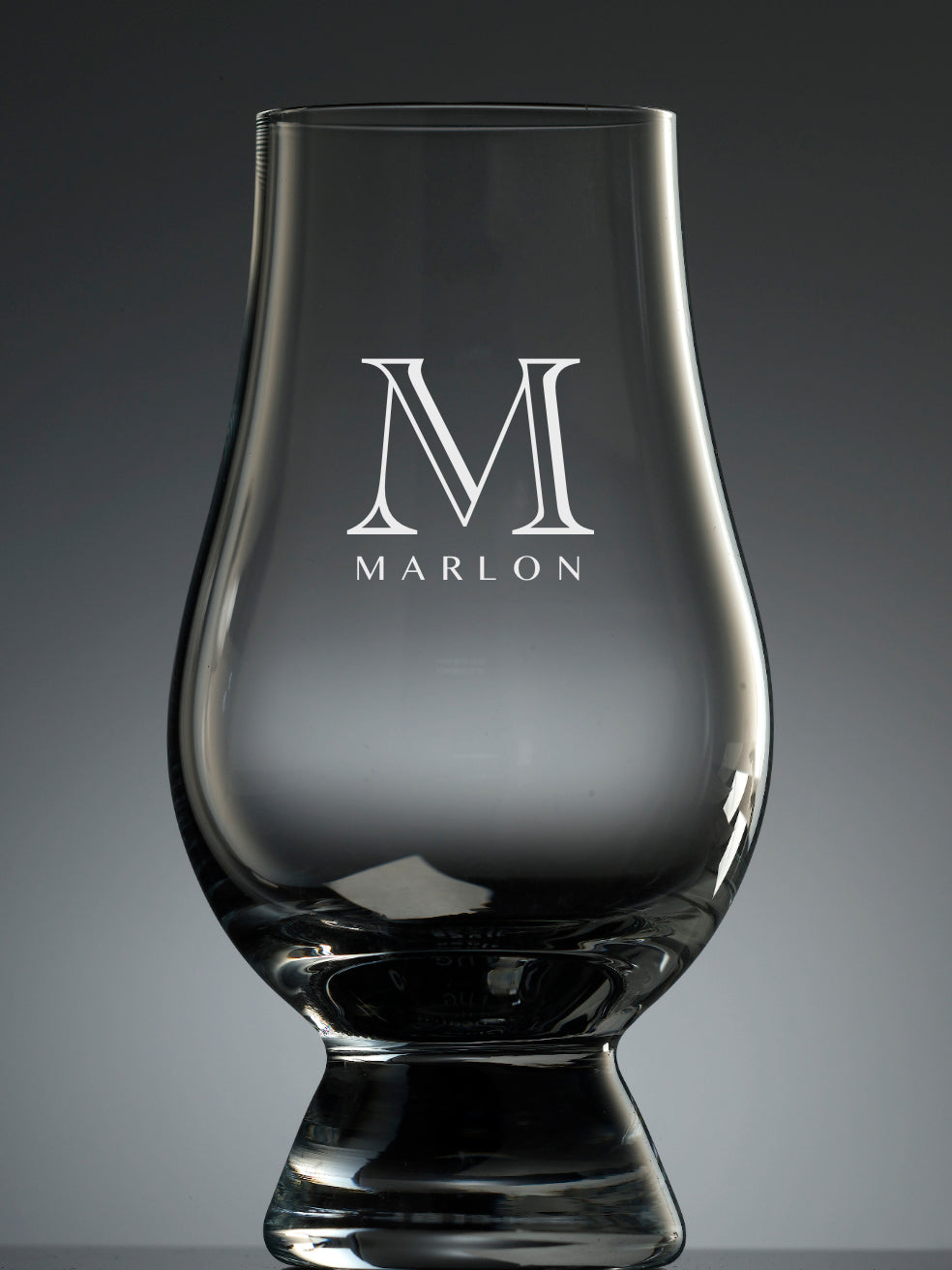 Make the Glencairn Whisky Glass personal with this monogrammed version. The first letter and full name will be etched using a laser. Please allow two weeks for completion plus deliver.