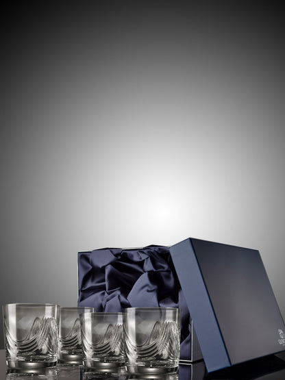 Set of four Montrose 24% lead-crystal tumblers in presentation box.