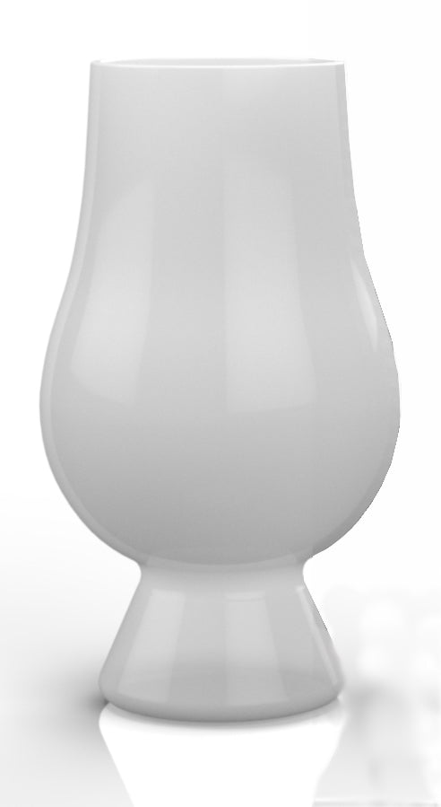 A white, tapered crystal whisky glass with a wide bowl by Glencairn.